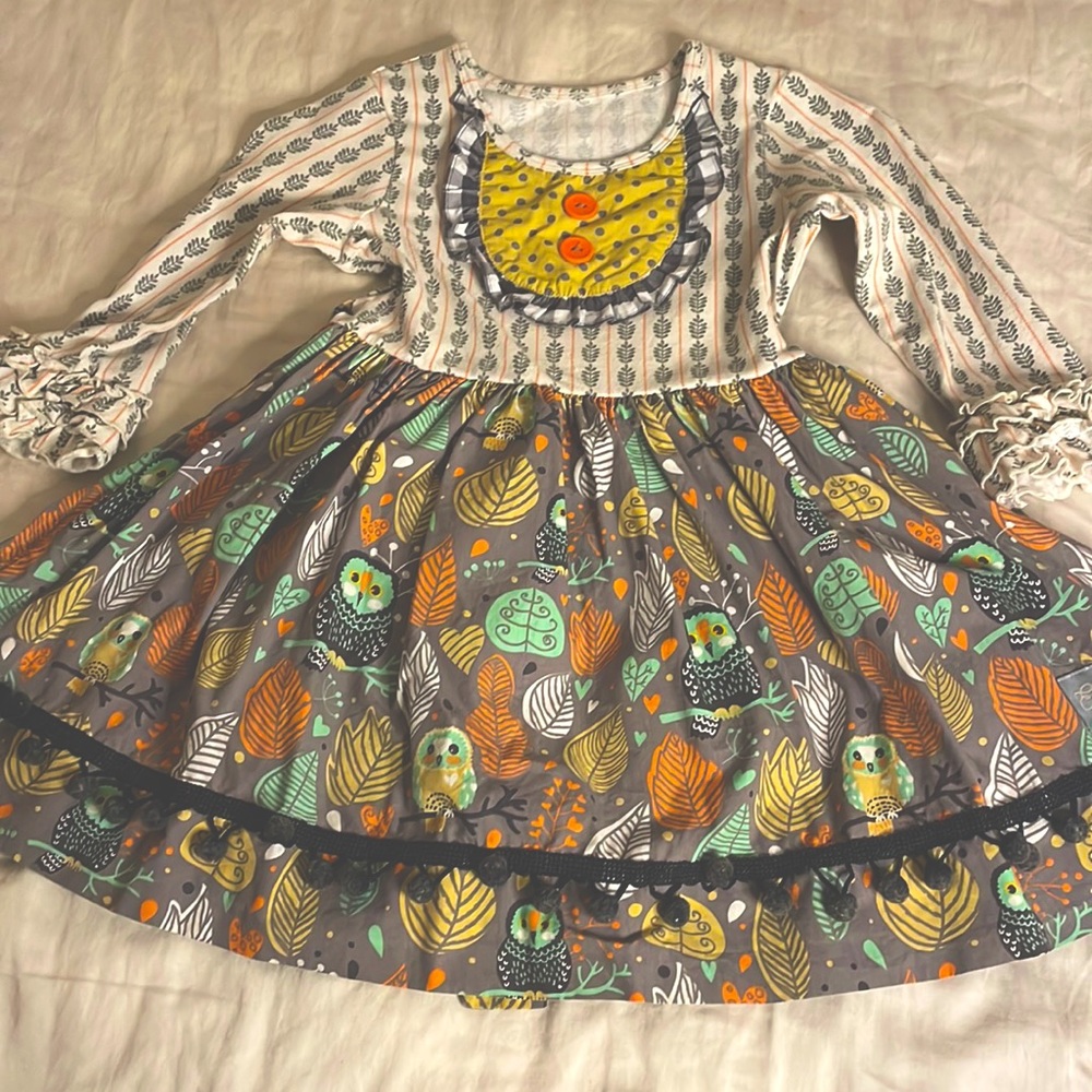Eleanor Rose owl pom pom dress.